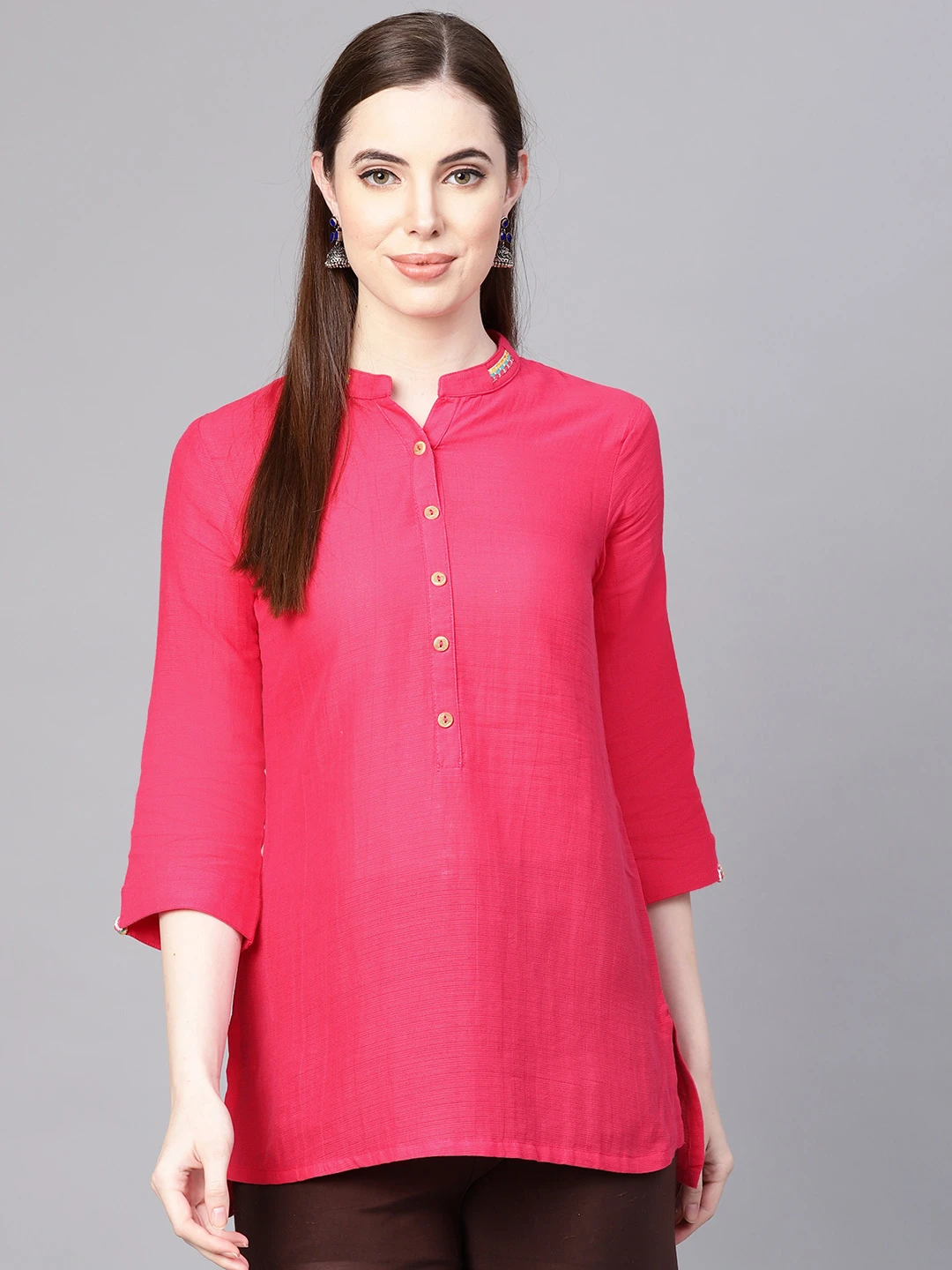 Women Pink Solid Straight Kurti